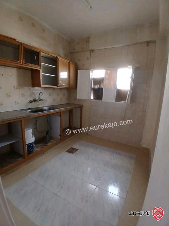 شقة مساحة 110م طابق تسوية للبيع في عمان - جبل التاج إشارات حي ام تينة والتاج شارع السيراوية 