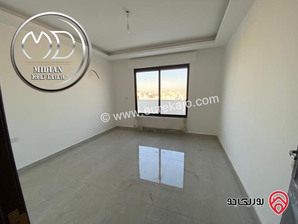 شقة شبه ارضي جديدة للبيع في عمان - الصويفية مساحة 165م مع ترس و حديقة 150م تشطيبات سوبر ديلوكس بسعر مميز جداً