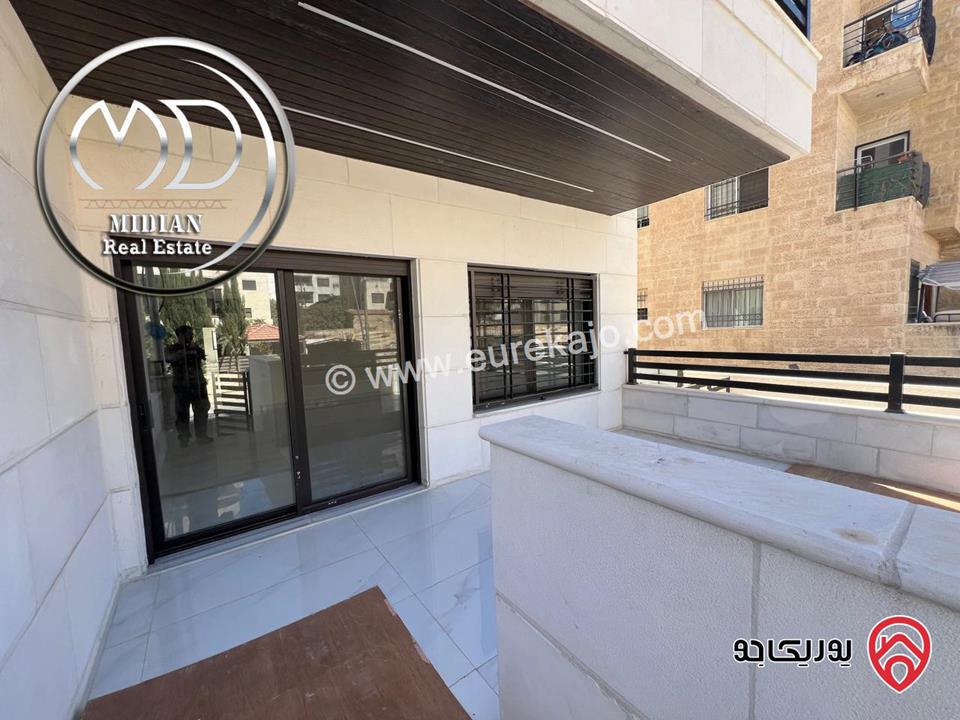 شقة ارضية جديدة للبيع في عمان - ضاحية الرشيد مساحة 185م مع ترس 40م تشطيبات ديكورات سوبر ديلوكس بسعر مميز جداً