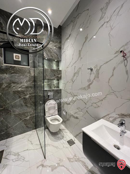 شقة ارضية جديدة للبيع في عمان - حي الصحابة مساحة 185م مع ترس و حديقة 150م تشطيبات ديكورات فاخرة و بسعر مميز