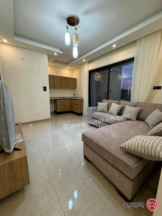 New furnished apartment with a Rooftop of 220 sqm for rent in Amman - Sweifieh (near Al Baraka Mall)