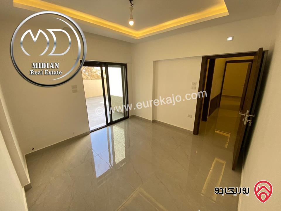 شقة شبه ارضي جديدة للبيع في عمان - تلاع العلي مساحة 200م مع ترس و حديقة 150م تشطيبات سوبر ديلوكس بسعر مميز جداً