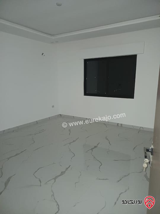 شقة مميزة تشطيب سوبر ديلوكس طابق ارضي مساحة 169م + ترس بناء جديد للبيع في عمان - المقابلين