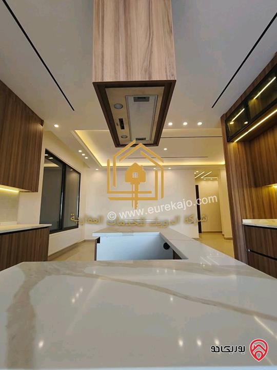 شقة جديدة لم تسكن أرضي مساحة 180م مع ترس 70م للإيجار في عمان - طريق المطار 