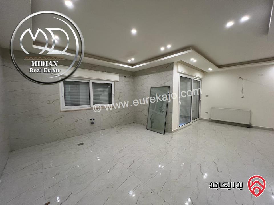 شقة أرضية للبيع في عمان - خلدا مساحة 185م مع ترس 40م تشطيبات سوبر ديلوكس جديدة لم تسكن بسعر مميز