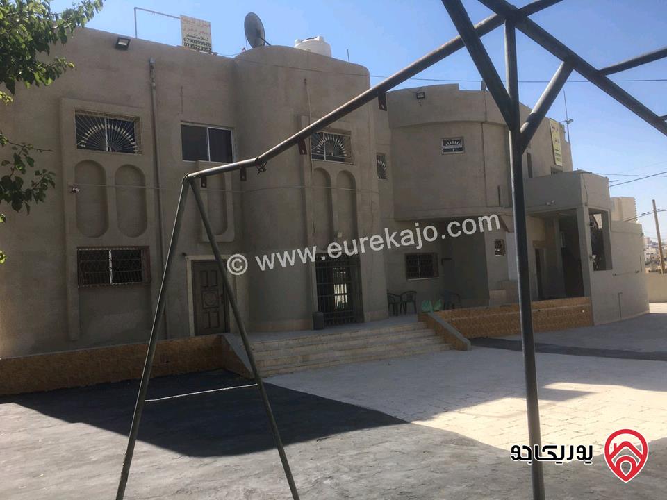 بيت مستقل مكون من خمس شقق على ارض مساحة 1480م للبيع في عمان - خريبة السوق