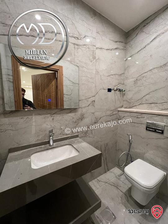 شقة أرضية للبيع في عمان - خلدا مساحة 185م مع ترس 40م تشطيبات سوبر ديلوكس جديدة لم تسكن بسعر مميز