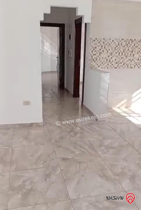 شقة ارضية مساحة 100م داخلي و 100م خارجي للبيع في عمان - الرابية