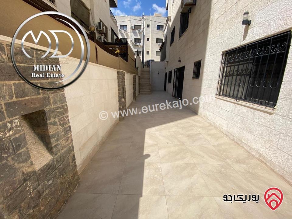 شقة شبه ارضي جديدة للبيع في عمان - طريق المطار مساحة 175م مع ترس و حديقة 100م إمكانية الأقساط بسعر مميز جداً