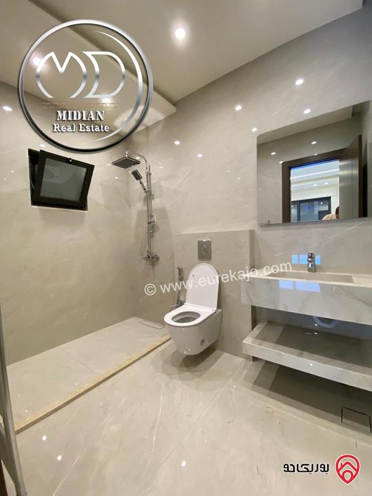 شقة دوبلكس طابق أخير مع روف للبيع في عمان - الرابية مساحة 205م مع تراسات تشطيبات ديكورات سوبر ديلوكس اطلالة رائعة