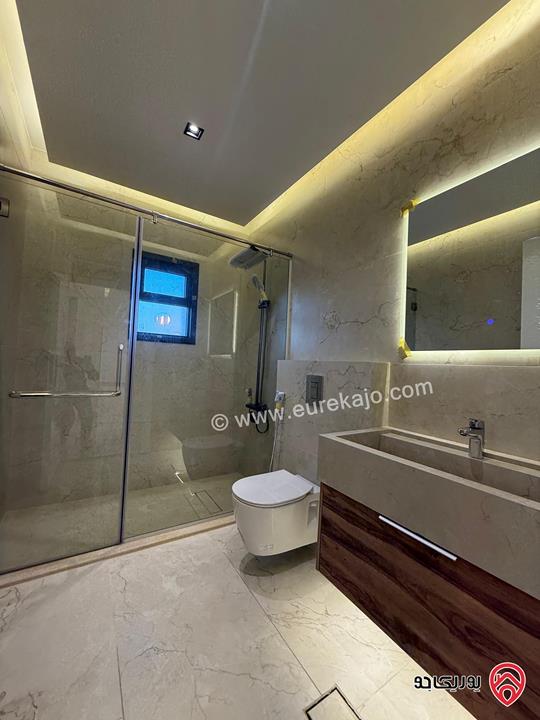 شقة طابق ارضي مساحة 227م مع ترس 60م سوبر ديلوكس للبيع في عمان - تلاع العلي