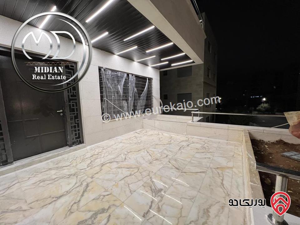 شقة أرضية جديدة للبيع في عمان - خلدا العوجانية مساحة 235م مع ترس 85م تشطيبات و ديكورات سوبر ديلوكس بسعر مميز