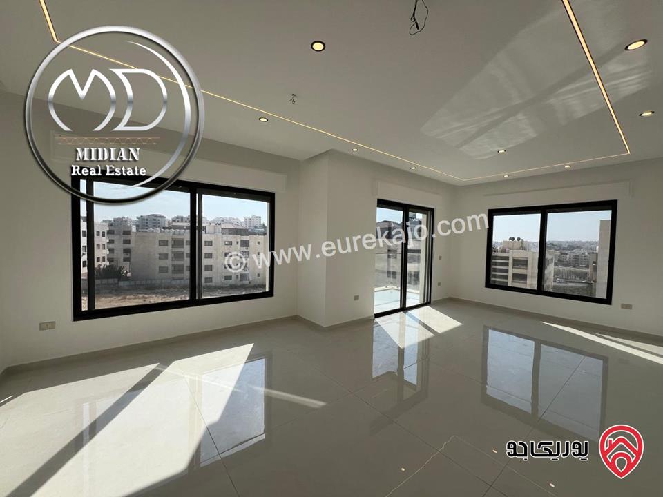 شقة دوبلكس جديدة طابق أخبر مع روف للبيع في عمان - حي الصحابة مساحة 215م مع تراسات اطلالة رائعة بسعر مميز