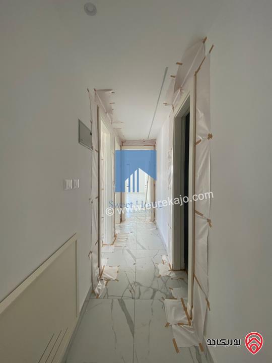 شقة فاخرة للبيع في عمان - أم السماق الشمالي خلف جامع التلاوي طابق ثالث 210م مع روف دوبلكس 120م لم تسكن