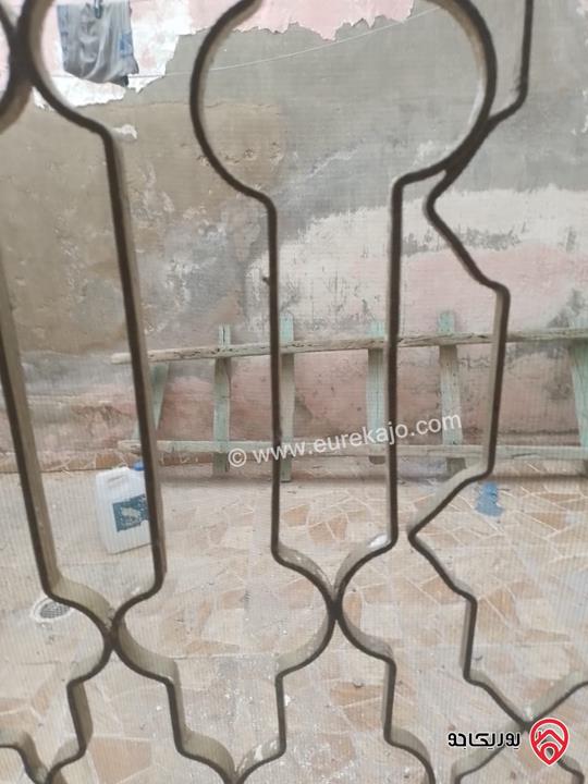 عمارة على قطعة ارض مساحة 250م للبيع في عمان - منطقة الوحدات
