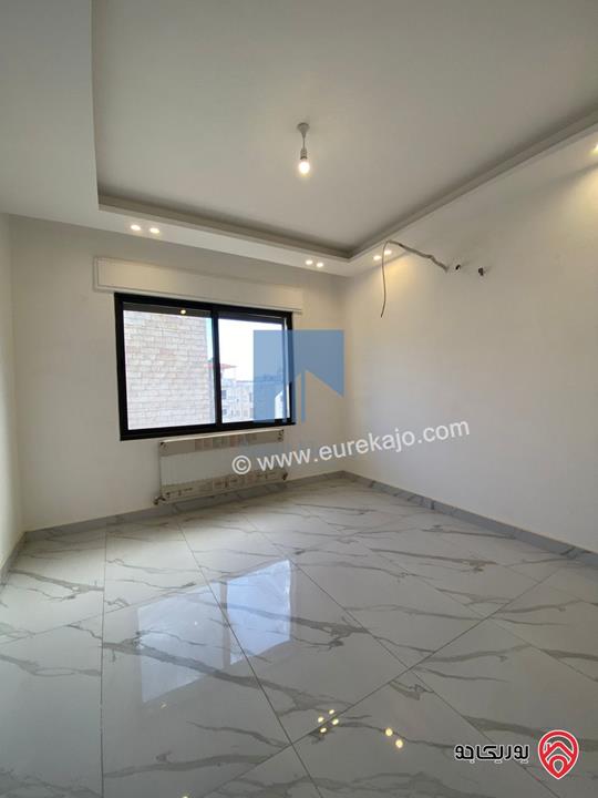 شقة فاخرة أرضية 184م مع ترس امامي 30م تشطيب سوبر ديلوكس لم تسكن للبيع في عمان - تلاع العلي