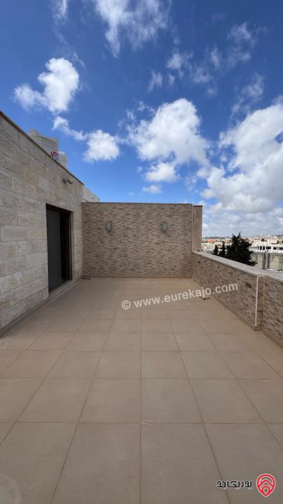 شقة طابق اخير مساحة 187م مع رووف منفصل 48م وترس 110م للبيع في عمان - مرج الحمام