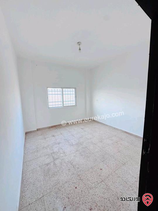عمارة مكونة من 10 شقق مؤجرة للبيع في مادبا حنينا