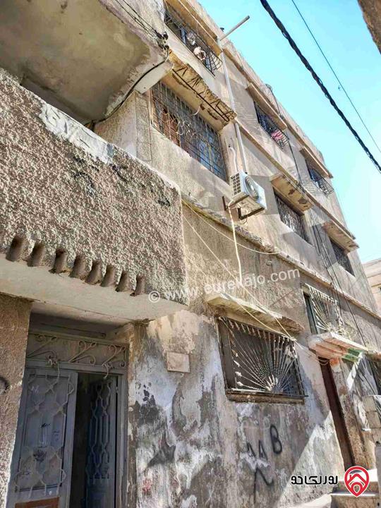 عمارة سكنية على أرض 250م للبيع في الزرقاء - الغويرية 