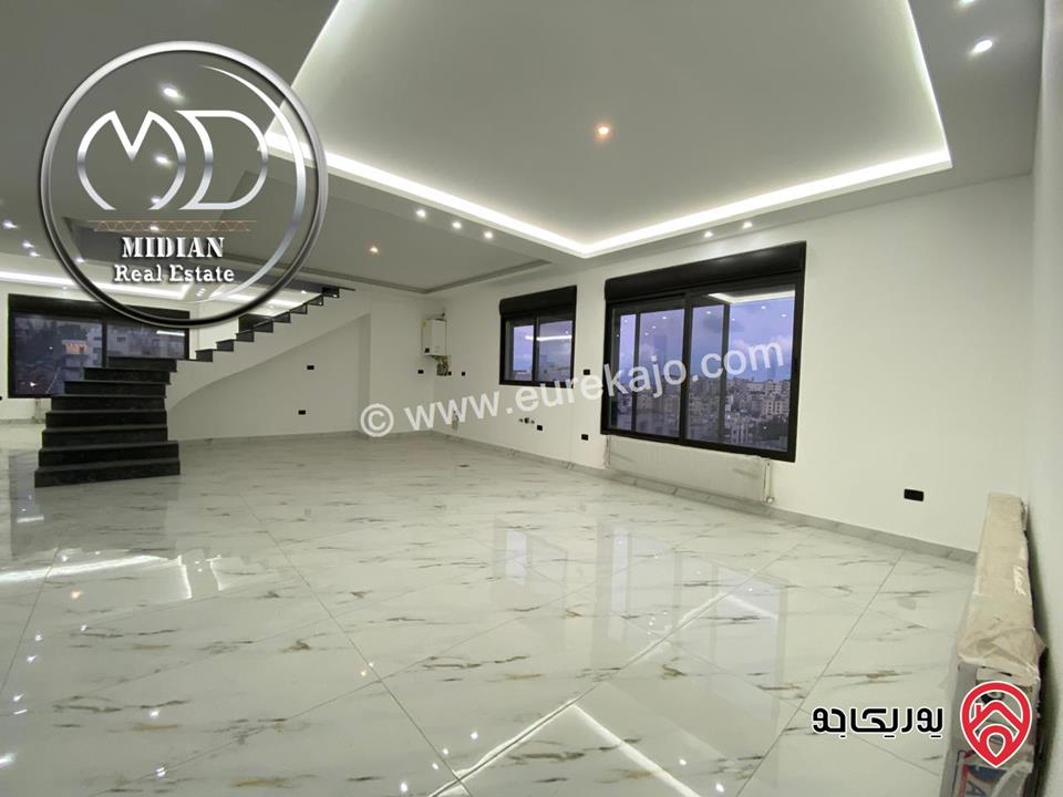 شقة دوبلكس جديدة للبيع في عمان - خلدا طابق أخير مع روف مساحة 210م مع تراسات اطلالة جميلة بسعر مميز