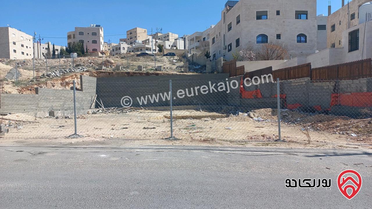 قطعة أرض مساحة 506م محفورة و مبني عليها جدران استنادية للبيع في عمان - ابو علندا ضاحية الفاروق اسكان الكهرباء