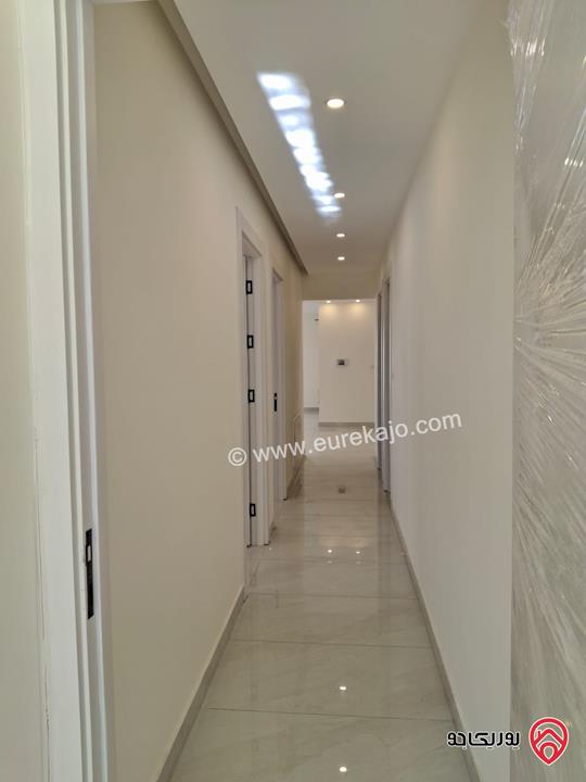 شقة جديدة طابق أول مساحة 175م للبيع في عمان - الرابية