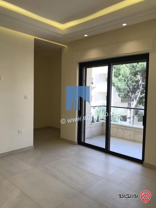 شقة طابقية فاخرة طابق اول مساحة 235م للبيع في عمان - الجندويل تشطيب سوبر ديلوكس لم تسكن