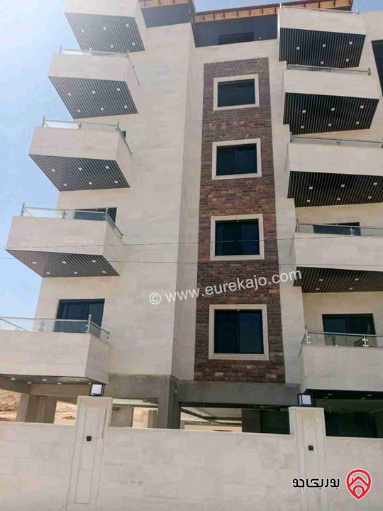 شقة جديدة لم تسكن طابق ثاني مساحة 80م للبيع في عمان - الجبيهة مقابل الجامعة الأردنية الباب الرئيسي