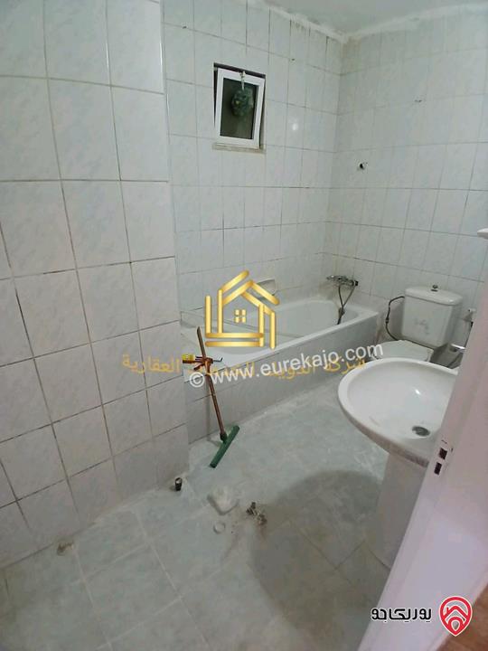 شقة فارغة طابق شبه ارضي مساحة 100م مع ترس 20م للإيجار في عمان - تلاع العلي 