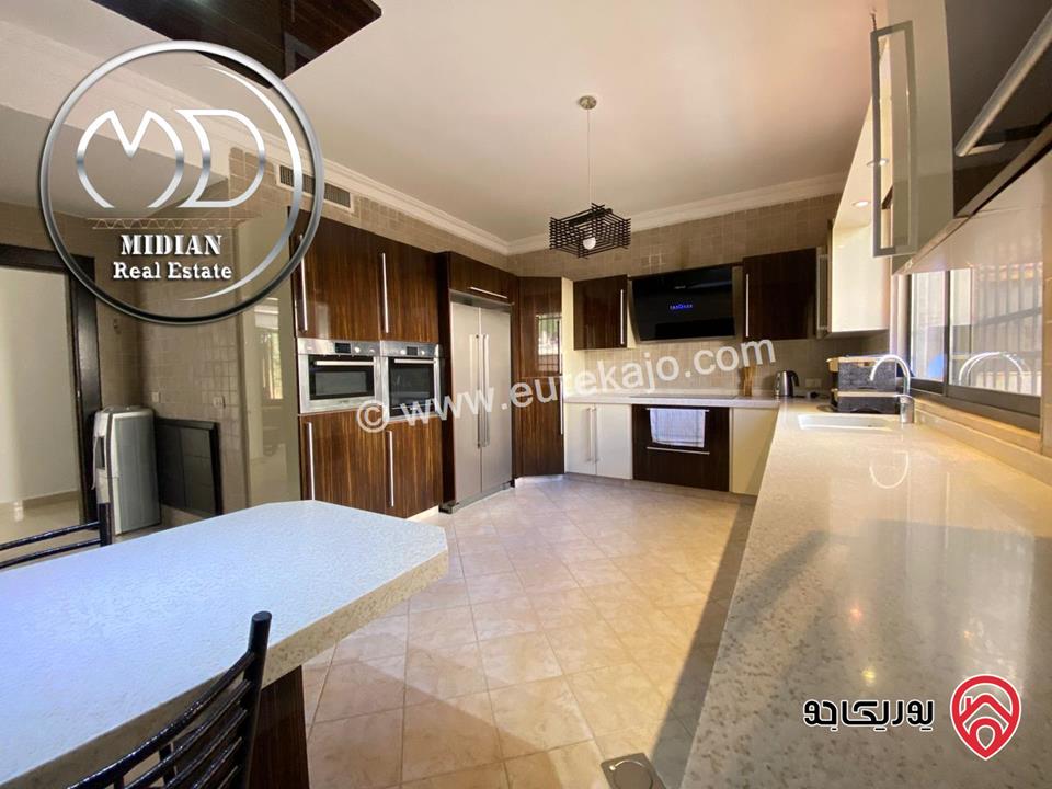 شقة شبه ارضي للبيع في عمان - خلدا العوجانية مساحة 200م مع تراسات و حدائق سوبر ديلوكس بسعر مميز