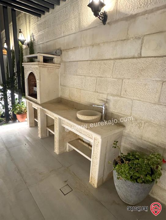 شقة شبه أرضية مساحة 135م داخلي مع حديقة 130م مفروشة بالكامل للايجار في عمان - عبدون