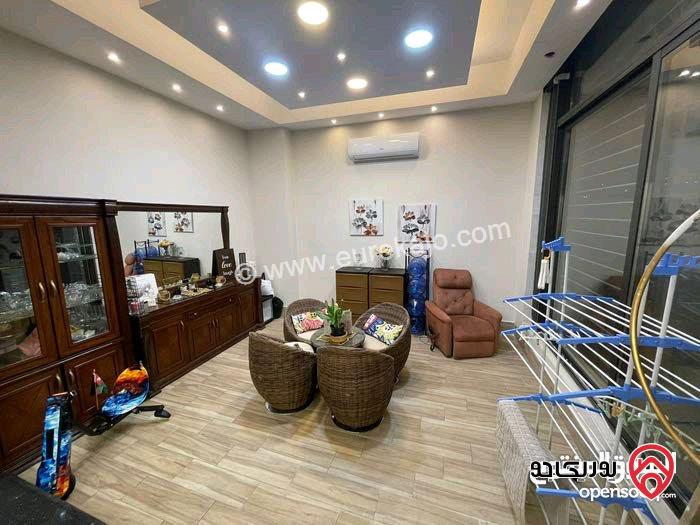 شقة طابقية ارضي معلق مساحة 226م داخلي و 180م خارجي بأطلالة للبيع في عمان - دابوق 