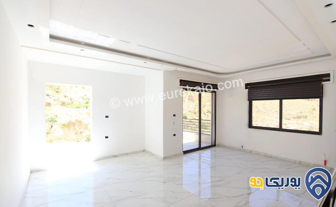 شقة مميزة للبيع في صويلح على حدود الجبيهة طابق تسوية 165م مع مدخل خاص واطلالة مميزة
