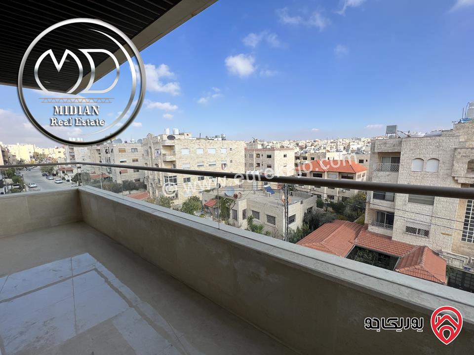 شقة دوبلكس جديدة طابق أخير مع روف للبيع في عمان - الدوار السابع مساحة 200م مع تراسات اطلالة رائعة بسعر مميز