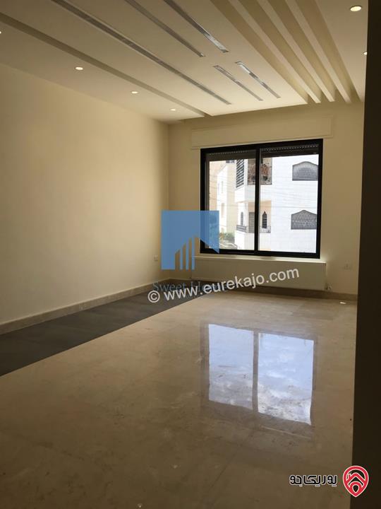 شقة طابقية فاخرة طابق اول مساحة 235م للبيع في عمان - الجندويل تشطيب سوبر ديلوكس لم تسكن