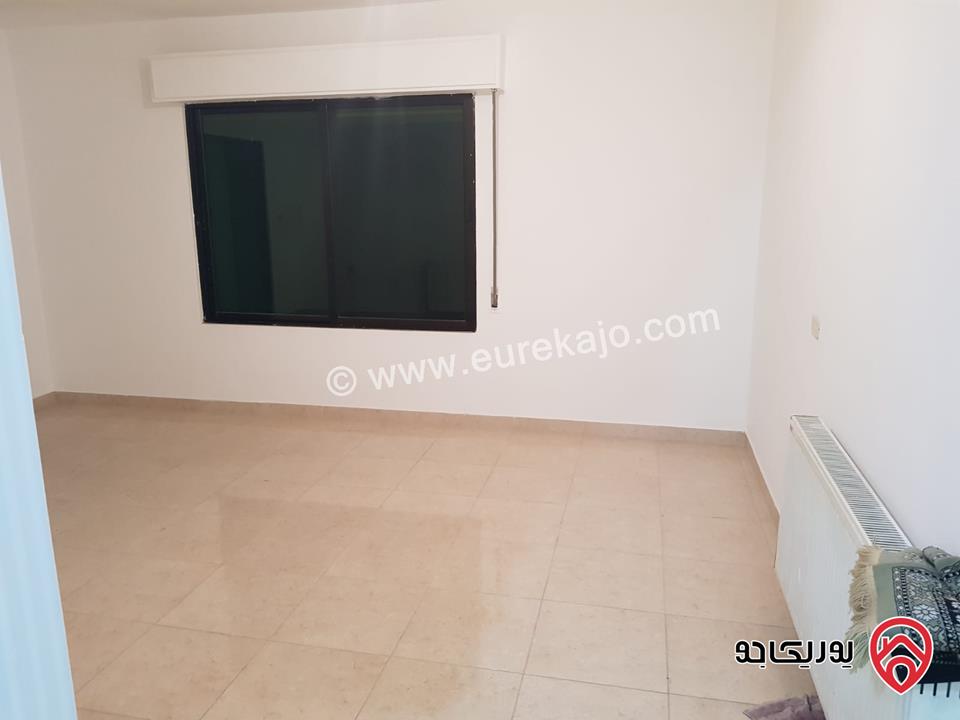 شقة ارضية مساحة 130 م مع ترس امامي 25م وكراج خاص للايجار في عمان - تلاع العلي 