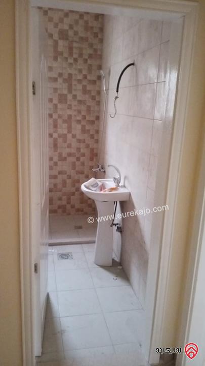 شقة طابق أول مساحة 128م للبيع في عمان - الجبل الأخضر حي نزال الشمالي 