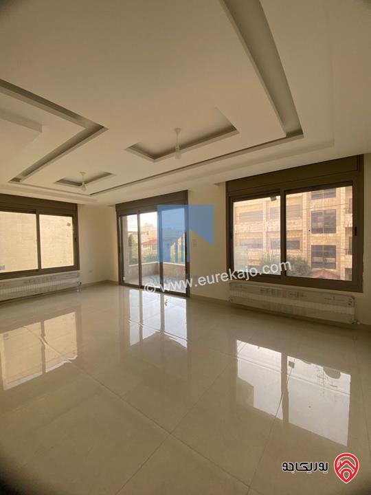 شقة فاخرة للبيع في عمان - أم أذينة قرب أبراج السادس طابق ثالث 162م مع روف دوبلكس 110م لم تسكن