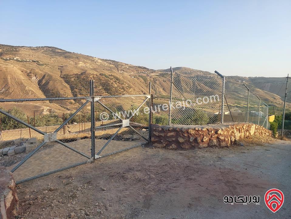 مزرعة مساحة 4 دونم للبيع في غرب عمان - البحاث 