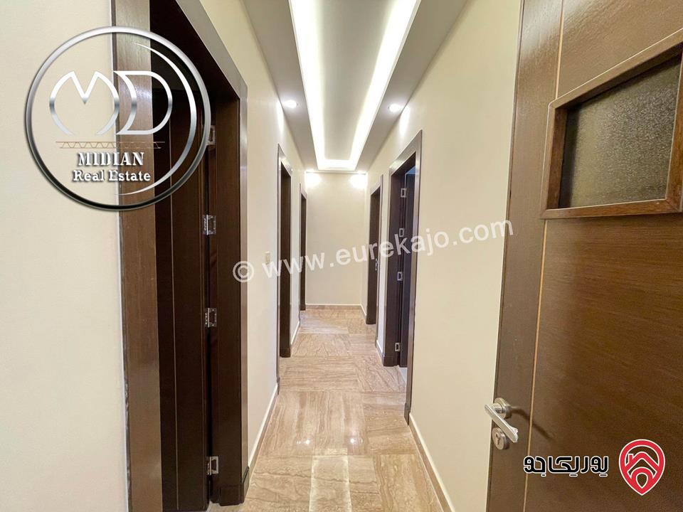 شقة شبه ارضي جديدة للبيع في عمان - ام السماق قرب الستي مول مساحة 160م مع ترس و حديقة 120م تشطيبات ديكورات فاخرة