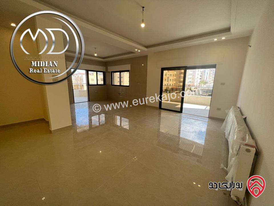 شقة دوبلكس جديدة للبيع طابق اخير مع روف في عمان - ضاحية الرشيد مساحة 215م مع تراسات اطلالة رائعة بسعر مميز جداً