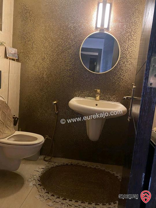 شقة شبه أرضية مساحة 129م للبيع مفروشة في عمان - خلدا