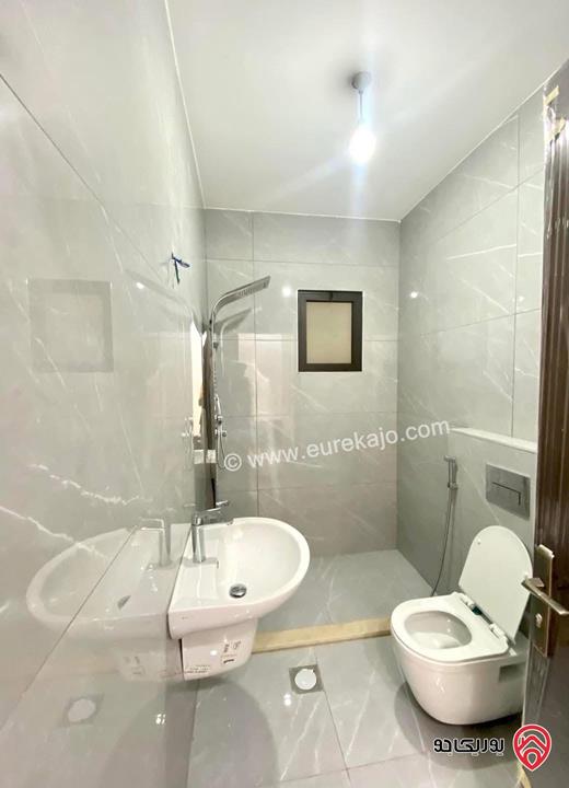 شقة ارضية مساحة 145م داخلي و 25م خارجي للبيع في عمان - ابو علندا اسكان الكهربا 