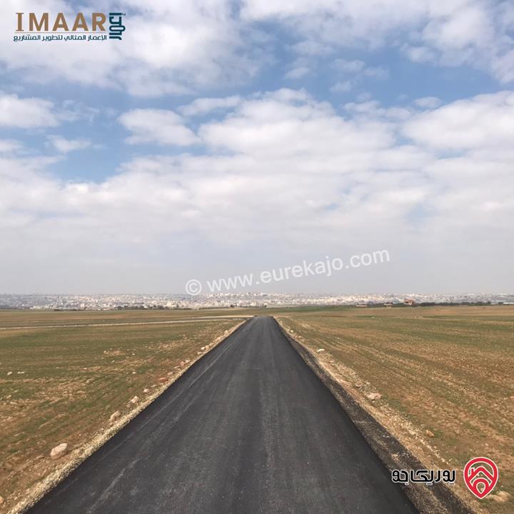 قطع أراضي 1000م للبيع سكن (أ) تبعد 9كم عن جسر المطار باتجاه مادبا - حوارة شارع البانوراما