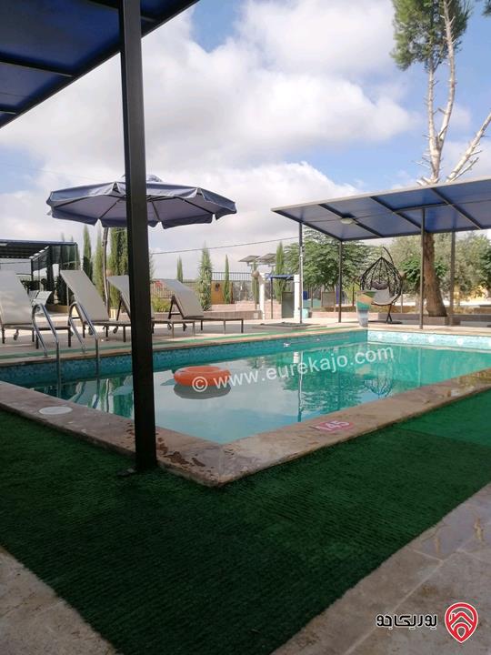 مزرعة ومنتجع مساحة الأرض 3 دونم و 700م والبناء 250م للبيع في اربد - كفر سوم قوشان مستقل استثمارية وسكنية