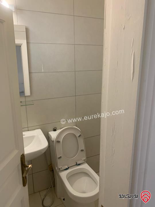 شقة طابق أول مساحة 180متر للايجار في عمان - الدوار الأول شارع الرينبو