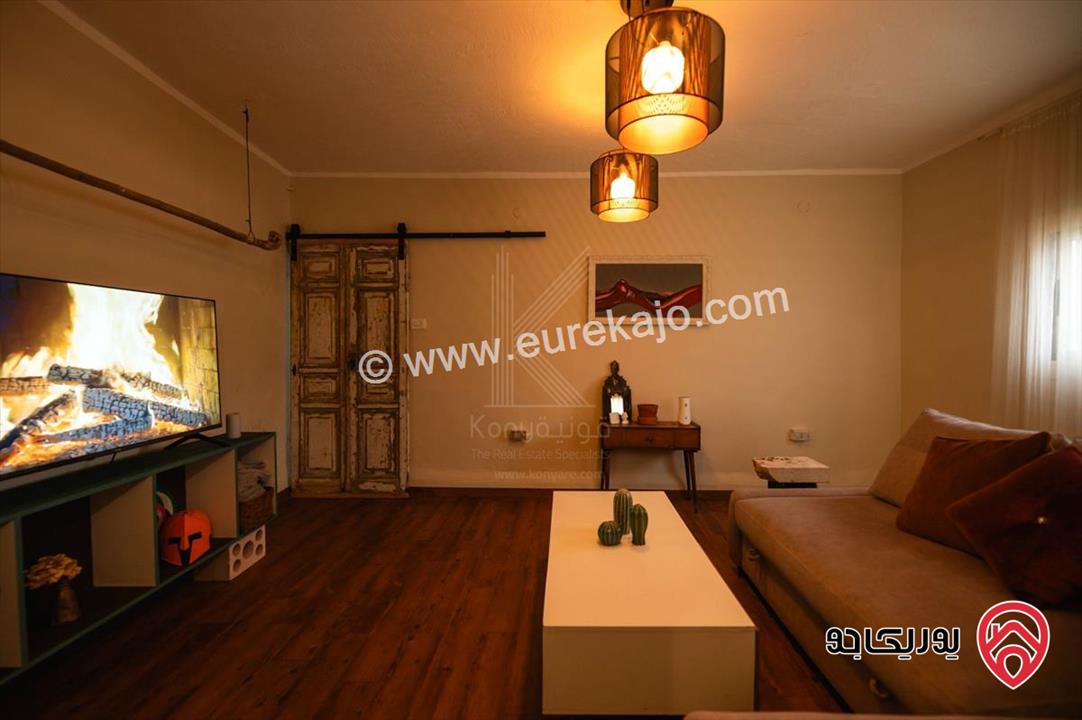 شقة مفروشة طابق أول مساحة 77م داخلي و 200م خارجي للايجار في جبل عمان