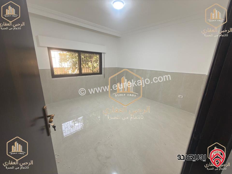 شقة فارغة طابق أرضي مساحة 110م داخلي و 30م خارجي للايجار في عمان - الرابية