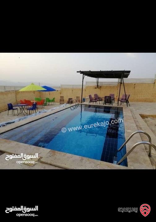 مزرعة و شاليه مساحة 480م وبناء 90م للبيع في البلقاء - دير علا ظهرة الرمل