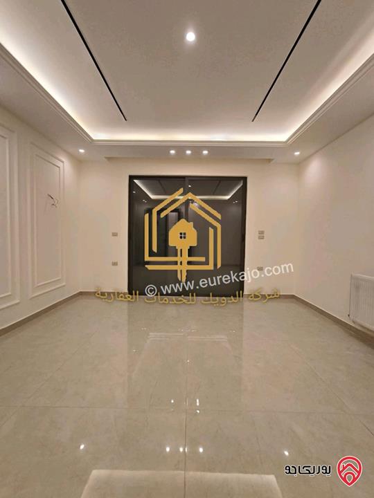 شقة جديدة لم تسكن أرضي مساحة 180م مع ترس 70م للإيجار في عمان - طريق المطار 